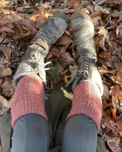 leather laced up boots and tall socks