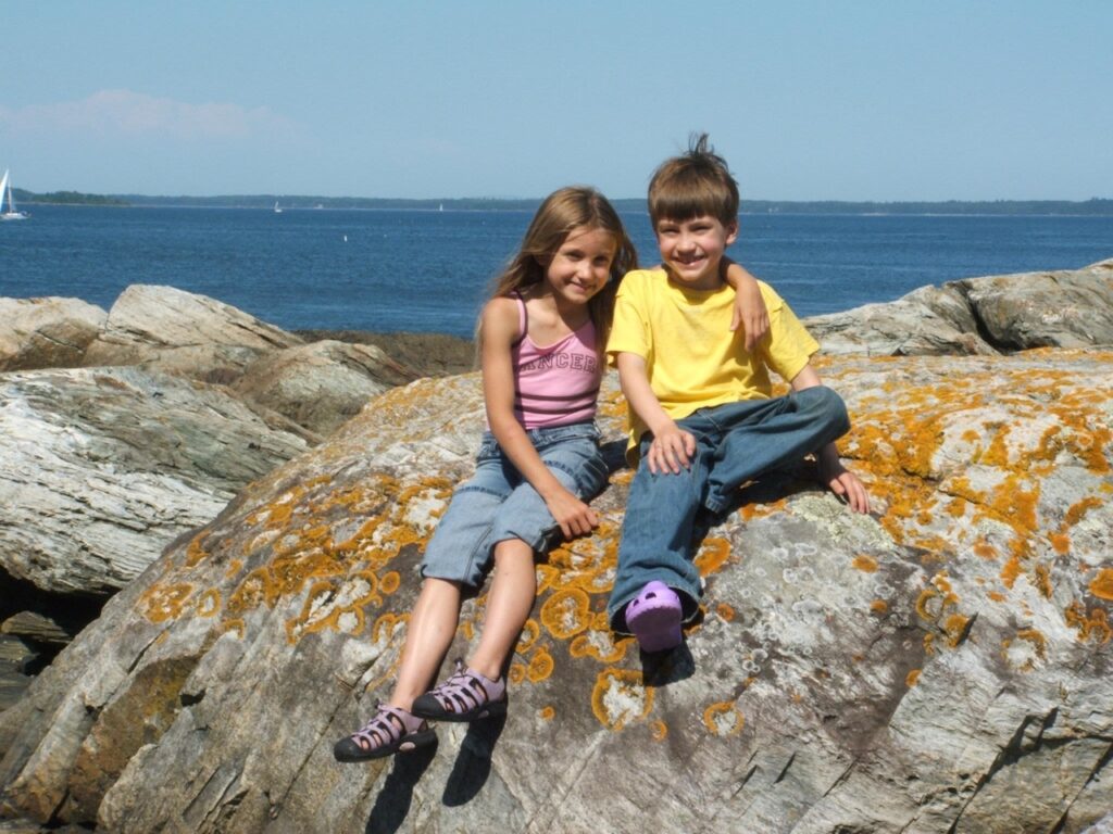 lichen on a stone in this photograph of my family on the maine coast 